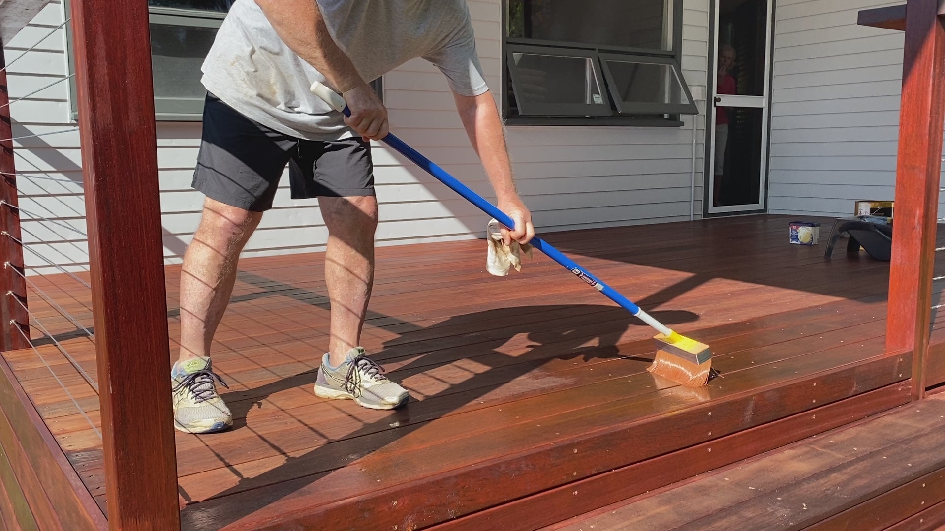 Applying Cutek Extreme CD50 to merbau decking